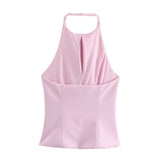 Rosa Halterneck-väst med Rosetter
